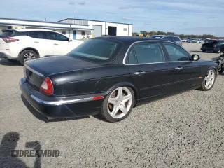 2005 Jaguar XJ Vanden Plas with VIN SAJWA82B05TG47030, listed as a Copart auction lot 41040574 with 114,520 mi miles and Salvage Title. Bid and sale history available at carsss.com. Image 3.