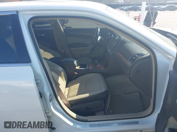 2013 Chrysler 300 Luxury Series with VIN 2C3CCASGXDH573689, listed as a IAAI auction lot 41782712 with 204,746 mi miles and . Bid and sale history available at DreamBid. Image 5.