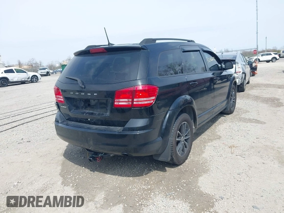 2018 Dodge Journey SE with VIN 3C4PDCAB7JT529454, listed as a IAAI auction lot 42066676 with 89,404 mi miles and . Bid and sale history available at carsss.com. Image 4.