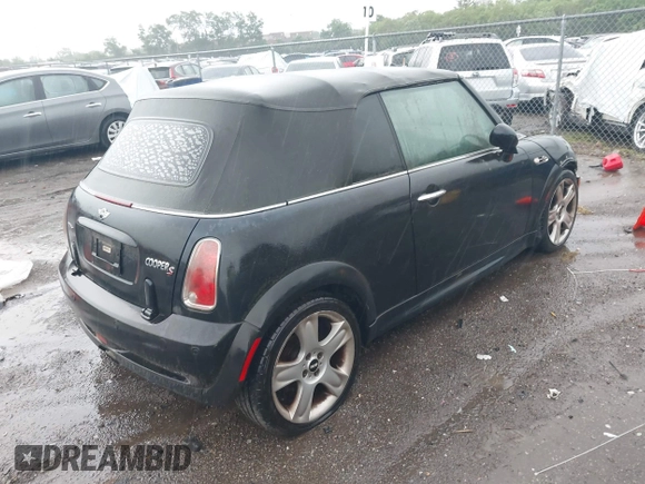 2006 MINI Convertible S with VIN WMWRH33516TF86823, listed as a IAAI auction lot 42184059 with Not Provided miles and . Bid and sale history available at DreamBid. Image 4.