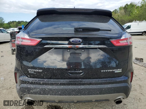 2019 Ford Edge Titanium z VIN 2FMPK3K91KBB54381, wystawiony jako Copart lot #52979555 z przebiegiem 99 127 mil mil oraz Szkoda całkowita • Salvage title. Historia ofert i sprzedaży dostępna na DreamBid. Obrazek 6.