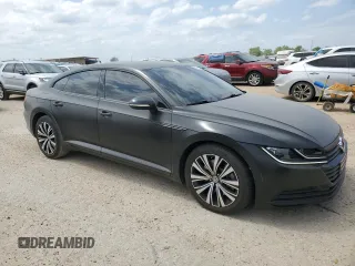 2020 Volkswagen Arteon SE z VIN WVWAR7AN7LE013526, wystawiony jako Copart lot #52791425 z przebiegiem 28 480 mil mil oraz Czysty tytuł • Clean title. Historia ofert i sprzedaży dostępna na DreamBid. Obrazek 4.