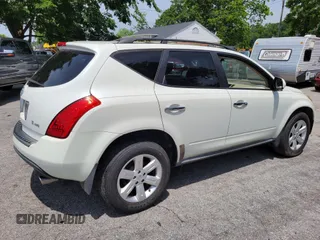 2006 Nissan Murano SL z VIN JN8AZ08W86W505314, wystawiony jako IAAI lot #42344742 z przebiegiem 169 403 mil mil oraz . Historia ofert i sprzedaży dostępna na DreamBid. Obrazek 4.