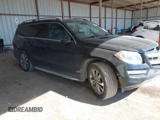 2013 Mercedes-Benz GL-Class GL 450 with VIN 4JGDF7CE7DA267258, listed as a IAAI auction lot 41634289 with 124,044 mi miles. Bid and sale history available at carsss.com. Image 1.