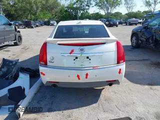 2009 Cadillac CTS RWD z VIN 1G6DF577190106800, wystawiony jako IAAI lot #42316470 z przebiegiem 147 836 mil mil oraz . Historia ofert i sprzedaży dostępna na DreamBid. Obrazek 17.
