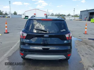2018 Ford Escape SE z VIN 1FMCU9GD1JUD48846, wystawiony jako IAAI lot #42112952 z przebiegiem 117 580 mil mil oraz . Historia ofert i sprzedaży dostępna na DreamBid. Obrazek 16.