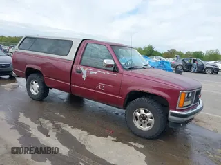 1989 GMC Sierra 1500 z VIN 1GTDK14K2KZ543765, wystawiony jako IAAI lot #42244127 z przebiegiem Nie podano mil oraz . Historia ofert i sprzedaży dostępna na DreamBid. Obrazek 1.
