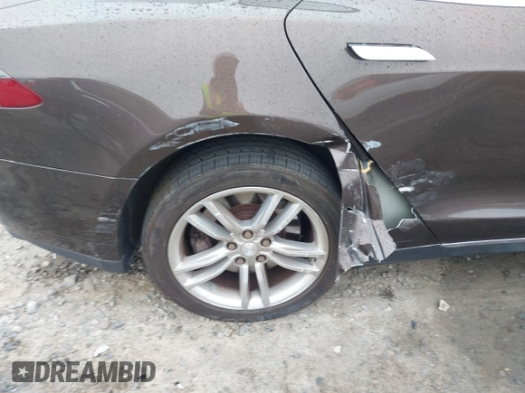 2013 Tesla Model S с VIN 5YJSA1CG0DFP14013, выставлен на аукционе IAAI как лот 42352134 с пробегом 99 996 миль миль и . История ставок и продаж доступна на DreamBid. Изображение 6.