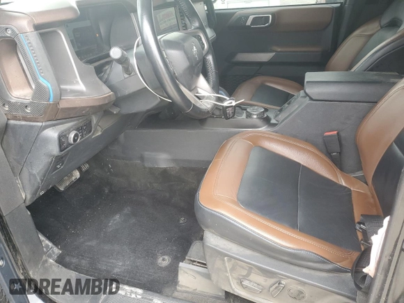 2023 Ford Bronco z VIN 1FMEE5DP3PLB59482, wystawiony jako Copart lot #59725815 z przebiegiem 54 741 mil mil oraz Szkoda całkowita • Salvage title. Historia ofert i sprzedaży dostępna na DreamBid. Obrazek 7.