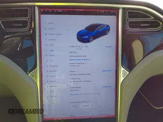 2014 Tesla Model S 60 z VIN 5YJSA1H15EFP48938, wystawiony jako IAAI lot #41574976 z przebiegiem 230 246 mil mil oraz . Historia ofert i sprzedaży dostępna na DreamBid. Obrazek 18.