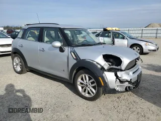 2012 MINI Countryman S with VIN WMWZC5C54CWL59076, listed as a Copart auction lot 48201505 with 172,253 mi miles and Salvage Title. Bid and sale history available at DreamBid. Image 4.
