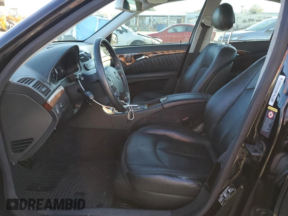 2004 Mercedes-Benz E-Class 5.0L with VIN WDBUF70J64A585084, listed as a Copart auction lot 80297124 with 233,638 mi miles and Salvage Title. Bid and sale history available at carsss.com. Image 7.