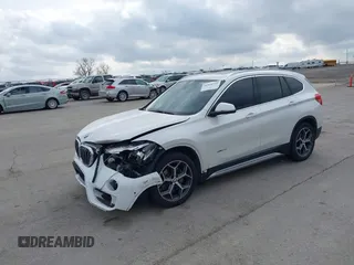 2016 BMW X1 xDrive28i with VIN WBXHT3C35GP886144, listed as a IAAI auction lot 41954742 with 89,268 mi miles. Bid and sale history available at carsss.com. Image 23.