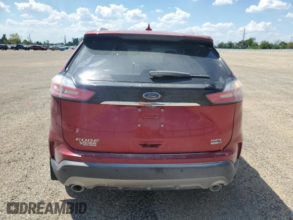 2020 Ford Edge SEL с VIN 2FMPK4J96LBA06946, выставлен на аукционе Copart как лот 56898855 с пробегом 54 984 миль миль и Списание • Salvage title. История ставок и продаж доступна на DreamBid. Изображение 6.