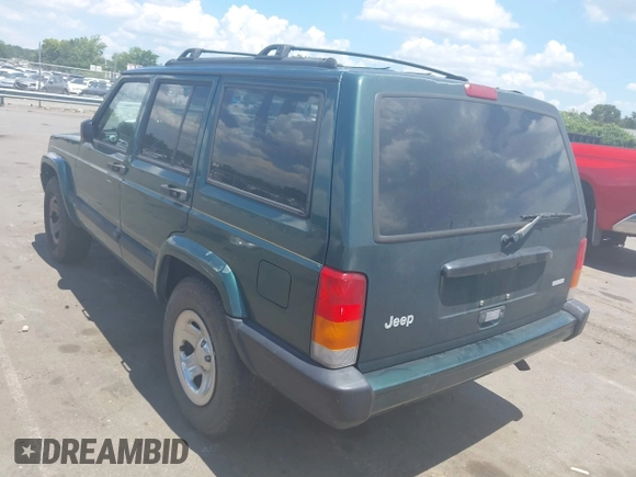 2000 Jeep Cherokee z VIN 1J4FT48S7YL134491, wystawiony jako IAAI lot #42789305 z przebiegiem 180 886 mil mil oraz . Historia ofert i sprzedaży dostępna na DreamBid. Obrazek 3.