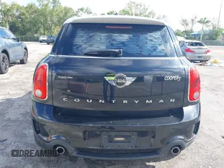 2013 MINI Countryman S z VIN WMWZC3C5XDWP24270, wystawiony jako IAAI lot #42232550 z przebiegiem 95 512 mil mil oraz . Historia ofert i sprzedaży dostępna na DreamBid. Obrazek 16.
