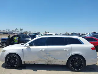 2010 Lincoln MKT EcoBoost with VIN 2LMHJ5AT6ABJ10752, listed as a IAAI auction lot 42140610 with Not Provided miles and . Bid and sale history available at DreamBid. Image 14.