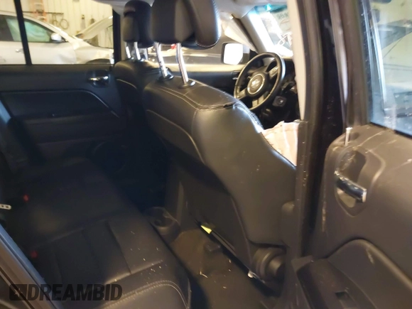 2016 Jeep Patriot Latitude with VIN 1C4NJRFB6GD581829, listed as a IAAI auction lot 41749132 with 106,614 mi miles and . Bid and sale history available at DreamBid. Image 8.