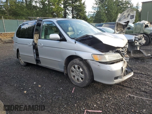 2003 Honda Odyssey EX-L with VIN 5FNRL18913B093284, listed as a Copart auction lot 82364343 with Not Provided miles and Salvage Title. Bid and sale history available at DreamBid. Image 4.