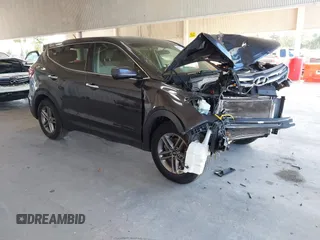 2018 Hyundai Santa Fe 2.4L z VIN 5XYZTDLB0JG573382, wystawiony jako IAAI lot #42352752 z przebiegiem 110 536 mil mil oraz . Historia ofert i sprzedaży dostępna na DreamBid. Obrazek 1.