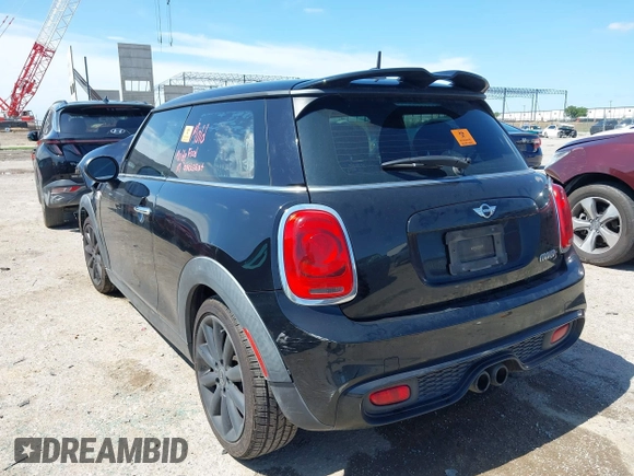 2016 MINI Hardtop S with VIN WMWXP7C51G3B49102, listed as a IAAI auction lot 42443771 with 97,626 mi miles and . Bid and sale history available at DreamBid. Image 3.
