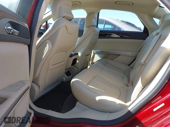 2013 Lincoln MKZ z VIN 3LN6L2G92DR825914, wystawiony jako IAAI lot #42020442 z przebiegiem 120 558 mil mil oraz . Historia ofert i sprzedaży dostępna na DreamBid. Obrazek 8.
