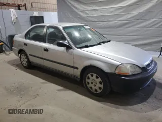 1998 Honda Civic LX with VIN 2HGEJ6675WH554442, listed as a Copart auction lot 53257865 with 104,597 mi miles and Clean Title. Bid and sale history available at DreamBid. Image 4.