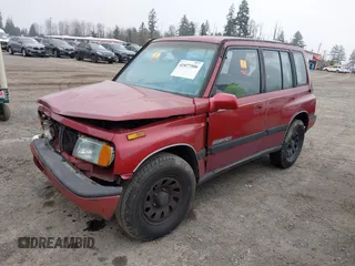 1995 Suzuki Sidekick z VIN JS3TD03V3S4106626, wystawiony jako IAAI lot #41877506 z przebiegiem 166 928 mil mil oraz . Historia ofert i sprzedaży dostępna na DreamBid. Obrazek 2.