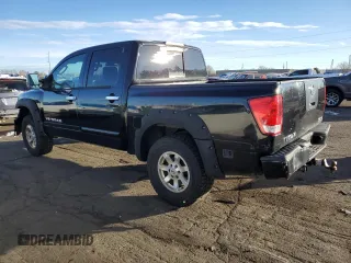 2004 Nissan Titan LE z VIN 1N6AA07B54N521567, wystawiony jako Copart lot #84048554 z przebiegiem 194 997 mil mil oraz Nie do naprawy • Non repairable. Historia ofert i sprzedaży dostępna na DreamBid. Obrazek 2.