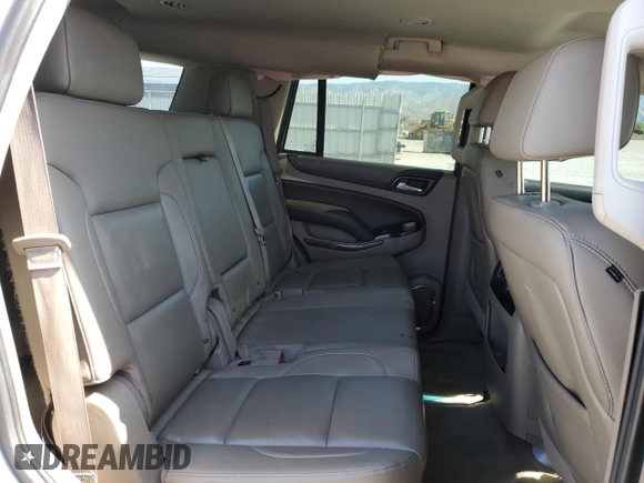 2015 Chevrolet Tahoe LT z VIN 1GNSCBKC4FR678751, wystawiony jako Copart lot #59235935 z przebiegiem 108 296 mil mil oraz Szkoda całkowita • Salvage title. Historia ofert i sprzedaży dostępna na DreamBid. Obrazek 11.