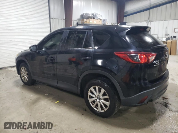 2015 Mazda CX-5 Sport with VIN JM3KE4BE1F0447267, listed as a Copart auction lot 82527174 with Not provided miles and Clean title. Bid and sale history available at DreamBid. Image 2.