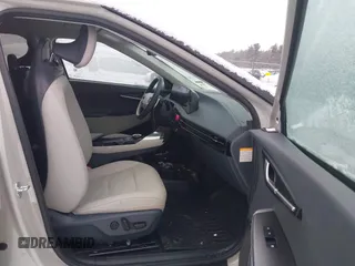 2022 Kia EV6 Wind z VIN KNDC3DLCXN5061934, wystawiony jako IAAI lot #41452465 z przebiegiem 74 923 mil mil oraz . Historia ofert i sprzedaży dostępna na DreamBid. Obrazek 5.