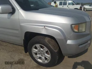 2007 Honda Ridgeline RTL z VIN 2HJYK16537H501200, wystawiony jako IAAI lot #42425662 z przebiegiem 188 618 mil mil oraz . Historia ofert i sprzedaży dostępna na DreamBid. Obrazek 18.