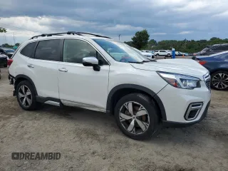 2019 Subaru Forester Touring with VIN JF2SKAWC7KH498438, listed as a Copart auction lot 61210595 with 65,754 mi miles and Salvage title. Bid and sale history available at DreamBid. Image 4.