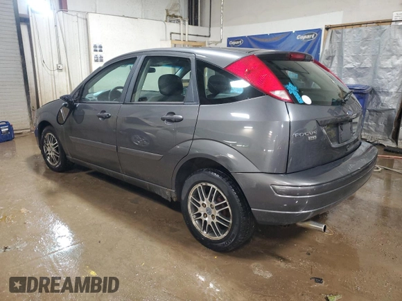 2005 Ford Focus S with VIN 3FAFP37N05R120564, listed as a Copart auction lot 49404935 with 102,254 mi miles and Salvage Title. Bid and sale history available at carsss.com. Image 2.