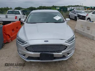 2017 Ford Fusion SE z VIN 3FA6P0HD5HR166433, wystawiony jako IAAI lot #42394998 z przebiegiem 121 333 mil mil oraz . Historia ofert i sprzedaży dostępna na DreamBid. Obrazek 12.