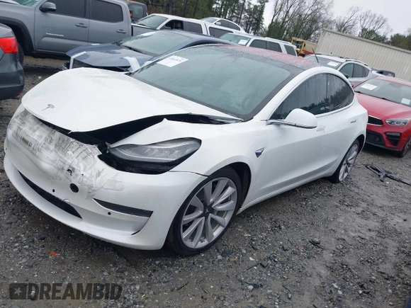 2018 Tesla Model 3 Long Range Battery z VIN 5YJ3E1EB8JF135728, wystawiony jako IAAI lot #41863870 z przebiegiem 124 053 mil mil oraz . Historia ofert i sprzedaży dostępna na DreamBid. Obrazek 17.