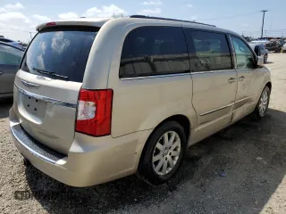 2014 Chrysler Town & Country Touring with VIN 2C4RC1BG0ER174758, listed as a Copart auction lot 59584065 with 192,965 mi miles and Salvage title. Bid and sale history available at DreamBid. Image 3.