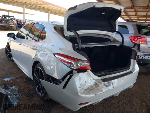 2018 Toyota Camry XSE with VIN 4T1BZ1HK3JU014085, listed as a IAAI auction lot 42235395 with 67,447 mi miles and . Bid and sale history available at DreamBid. Image 3.