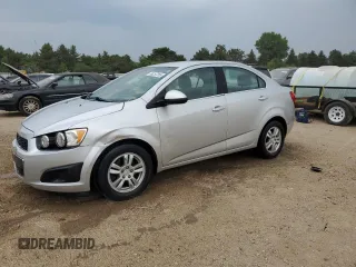 2012 Chevrolet Sonic LT with VIN 1G1JC5SH7C4110240, listed as a Copart auction lot 58257265 with 101,738 mi miles and Salvage title. Bid and sale history available at DreamBid. Image 1.