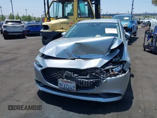 2020 Mazda 3 Select with VIN 3MZBPACL1LM131999, listed as a IAAI auction lot 42433532 with 23,067 mi miles and . Bid and sale history available at DreamBid. Image 6.