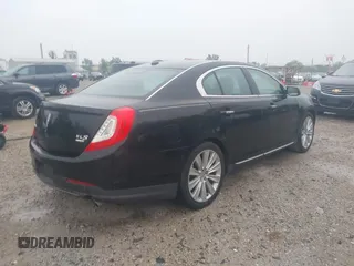 2013 Lincoln MKS EcoBoost with VIN 1LNHL9FT4DG607785, listed as a IAAI auction lot 42279833 with 126,548 mi miles and . Bid and sale history available at DreamBid. Image 4.