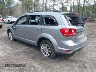 2015 Dodge Journey SXT with VIN 3C4PDCBG5FT696882, listed as a IAAI auction lot 41848362 with 175,039 mi miles and . Bid and sale history available at DreamBid. Image 3.