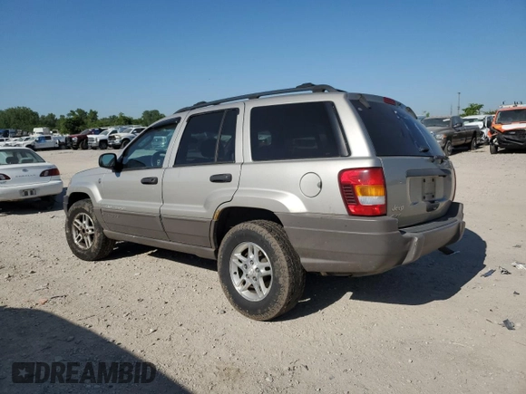 2004 Jeep Grand Cherokee Laredo with VIN 1J4GW48S34C307347, listed as a Copart auction lot 55749565 with Not provided miles and Salvage title. Bid and sale history available at DreamBid. Image 2.