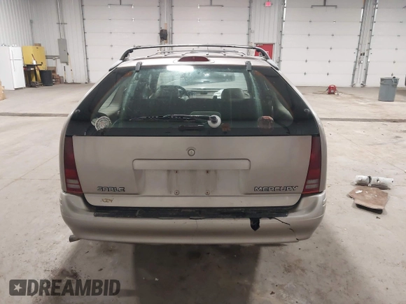 1994 Mercury Sable z VIN 1MELM5848RG607787, wystawiony jako IAAI lot #41938845 z przebiegiem 135 611 mil mil oraz . Historia ofert i sprzedaży dostępna na DreamBid. Obrazek 16.