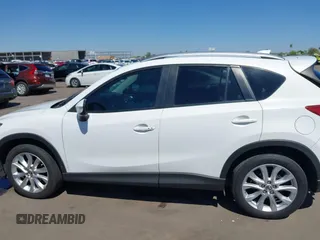 2015 Mazda CX-5 Grand Touring with VIN JM3KE2DYXF0493370, listed as a IAAI auction lot 42087156 with 161,464 mi miles. Bid and sale history available at carsss.com. Image 14.