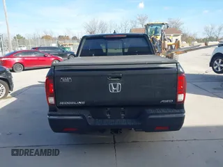 2020 Honda Ridgeline RTL with VIN 5FPYK3F59LB023212, listed as a IAAI auction lot 40704228 with 73,259 mi miles and . Bid and sale history available at DreamBid. Image 17.