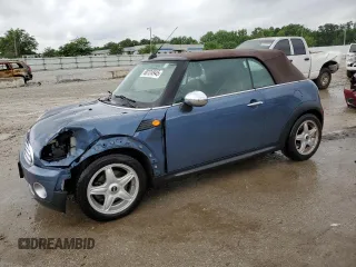 2009 MINI Convertible with VIN WMWMR33579TU96147, listed as a Copart auction lot 60124945 with 94,612 mi miles and Non repairable. Bid and sale history available at DreamBid. Image 1.