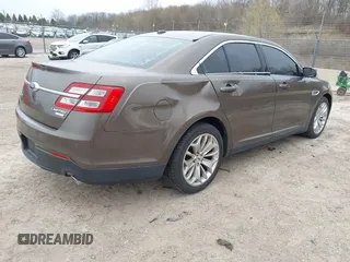 2015 Ford Taurus Limited with VIN 1FAHP2J84FG110702, listed as a IAAI auction lot 42060437 with 208,012 mi miles. Bid and sale history available at carsss.com. Image 4.