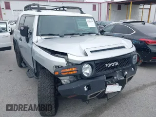 2007 Toyota FJ Cruiser with VIN JTEBU11F370036941, listed as a IAAI auction lot 42024330 with 164,703 mi miles. Bid and sale history available at carsss.com. Image 1.